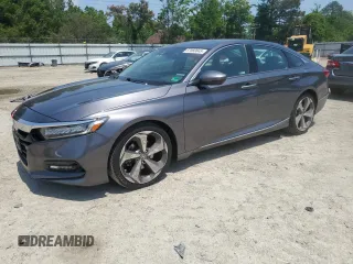 2019 Honda Accord Touring z VIN 1HGCV2F95KA028021, wystawiony jako Copart lot #57060845 z przebiegiem 86 014 mil mil oraz Szkoda całkowita • Salvage title. Historia ofert i sprzedaży dostępna na DreamBid. Obrazek 1.