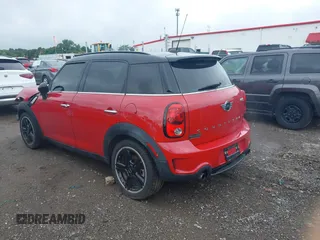 2015 MINI Countryman S with VIN WMWZC3C57FWT04338, listed as a IAAI auction lot 42524134 with 52,137 mi miles and . Bid and sale history available at DreamBid. Image 3.