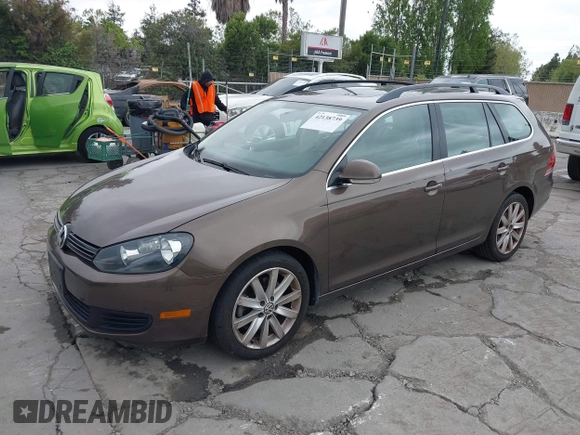 2012 Volkswagen Jetta SportWagen TDI with VIN 3VWPL7AJ1CM602054, listed as a IAAI auction lot 42138739 with 140,202 mi miles. Bid and sale history available at carsss.com. Image 2.