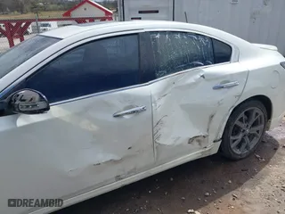 2014 Nissan Maxima 3.5 SV w/Sport Pkg with VIN 1N4AA5AP7EC447012, listed as a IAAI auction lot 41854199 with 219,367 mi miles. Bid and sale history available at carsss.com. Image 6.