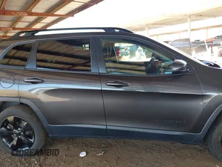 2016 Jeep Cherokee Latitude with VIN 1C4PJLCS4GW184621, listed as a IAAI auction lot 42007342 with 120,609 mi miles and . Bid and sale history available at DreamBid. Image 13.