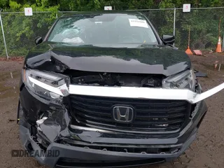 2021 Honda Ridgeline RTL-E with VIN 5FPYK3F75MB015370, listed as a IAAI auction lot 42253586 with 84,188 mi miles and . Bid and sale history available at DreamBid. Image 12.