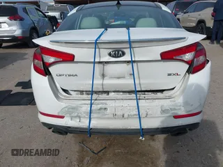 2013 Kia Optima SX with VIN 5XXGR4A62DG233168, listed as a IAAI auction lot 41820220 with 153,526 mi miles. Bid and sale history available at carsss.com. Image 16.