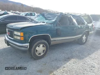 1998 GMC Yukon z VIN 1GKEK13R2WJ731178, wystawiony jako IAAI lot #41339082 z przebiegiem 291 604 mil mil oraz . Historia ofert i sprzedaży dostępna na DreamBid. Obrazek 2.