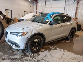 2020 Alfa Romeo Stelvio Sport with VIN ZASPAKAN7L7C97725, listed as a IAAI auction lot 41627878 with 43,523 mi miles. Bid and sale history available at carsss.com. Image 2.