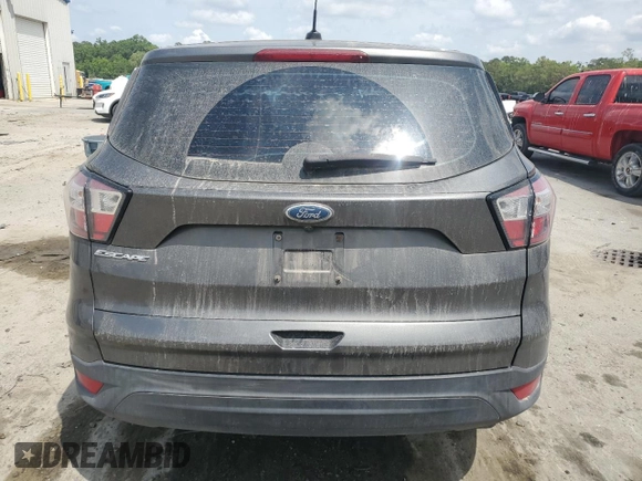 2018 Ford Escape S with VIN 1FMCU0F7XJUA71377, listed as a Copart auction lot 53922215 with 57,459 mi miles and Salvage title. Bid and sale history available at DreamBid. Image 6.