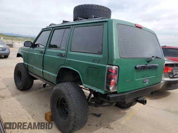 1998 Jeep Cherokee Sport with VIN 1J4FJ68SXWL210381, listed as a Copart auction lot 58398995 with 211,870 mi miles and Salvage title. Bid and sale history available at DreamBid. Image 2.