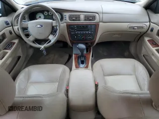 2006 Ford Taurus SEL with VIN 1FAFP56U86A194072, listed as a Copart auction lot 63779615 with 77,377 mi miles and Salvage title. Bid and sale history available at DreamBid. Image 8.