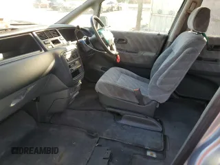 1997 Honda Odyssey with VIN RA11239041, listed as a Copart auction lot 85819024 with 79,952 mi miles and Salvage title. Bid and sale history available at DreamBid. Image 7.