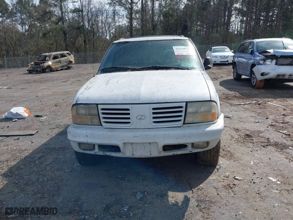 1998 Oldsmobile Bravada with VIN 1GHDT13W2W2706912, listed as a IAAI auction lot 41629870 with 210,907 mi miles. Bid and sale history available at carsss.com. Image 6.