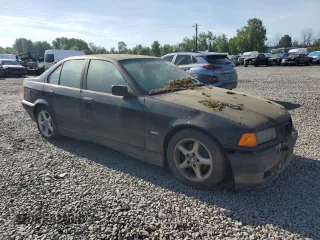 1998 BMW 3 Series 328iA with VIN WBACD4329WAV61738, listed as a Copart auction lot 68561744 with 0 mi miles and Salvage Title. Bid and sale history available at carsss.com. Image 4.