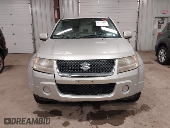 2012 Suzuki Grand Vitara Premium z VIN JS3TD0D62C4100440, wystawiony jako IAAI lot #41711815 z przebiegiem 171 527 mil mil oraz . Historia ofert i sprzedaży dostępna na DreamBid. Obrazek 12.