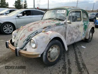 1969 Volkswagen Beetle with VIN 119770560, listed as a Copart auction lot 84329174 with 36,172 mi miles and Clean Title. Bid and sale history available at DreamBid. Image 1.