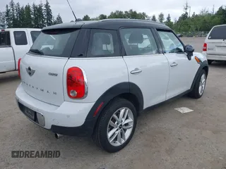 2014 MINI Countryman with VIN WMWZB3C5XEWR37594, listed as a IAAI auction lot 42500466 with 67,589 mi miles and . Bid and sale history available at DreamBid. Image 4.