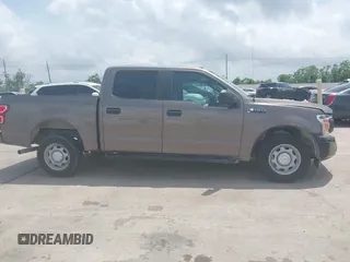 2019 Ford F-150 XL z VIN 1FTEW1CP2KKE83484, wystawiony jako IAAI lot #42057244 z przebiegiem 98 612 mil mil oraz . Historia ofert i sprzedaży dostępna na DreamBid. Obrazek 13.