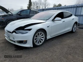 2017 Tesla Model S 100D with VIN 5YJSA1E24HF186757, listed as a Copart auction lot 51511745 with 242,779 mi miles and Salvage Title. Bid and sale history available at carsss.com. Image 1.