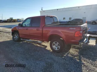 2002 Ford F-150 XLT with VIN 1FTRW08L02KB81578, listed as a Copart auction lot 47069215 with 201,148 mi miles and Salvage Title. Bid and sale history available at carsss.com. Image 2.