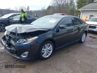 2014 Toyota Avalon Limited with VIN 4T1BK1EB2EU103936, listed as a IAAI auction lot 41703894 with 104,657 mi miles. Bid and sale history available at carsss.com. Image 18.