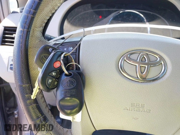 2011 Toyota Sienna XLE AAS with VIN 5TDYK3DCXBS172586, listed as a IAAI auction lot 41835992 with 203,599 mi miles. Bid and sale history available at carsss.com. Image 11.