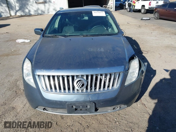 2011 Mercury Milan Premier z VIN 3MEHM0JG5BR601439, wystawiony jako IAAI lot #41278172 z przebiegiem 185 201 mil mil oraz . Historia ofert i sprzedaży dostępna na DreamBid. Obrazek 12.