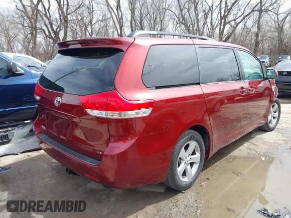 2011 Toyota Sienna LE AAS with VIN 5TDKK3DC7BS007097, listed as a IAAI auction lot 41802056 with 170,471 mi miles. Bid and sale history available at carsss.com. Image 4.