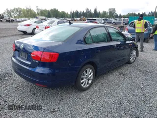 2012 Volkswagen Jetta SE with VIN 3VWDX7AJ0CM468578, listed as a IAAI auction lot 42306213 with Not provided miles and . Bid and sale history available at DreamBid. Image 4.