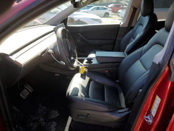 2021 Tesla Model Y Long Range with VIN 5YJYGAEE4MF260627, listed as a Copart auction lot 49091655 with 67,850 mi miles and Salvage Title. Bid and sale history available at DreamBid. Image 7.