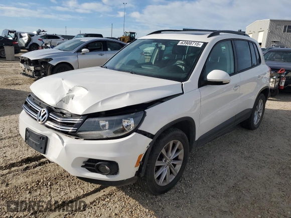 2014 Volkswagen Tiguan Trendline with VIN WVGJV3AX9EW540904, listed as a Copart auction lot 63908715 with Not provided miles and Salvage title. Bid and sale history available at DreamBid. Image 1.
