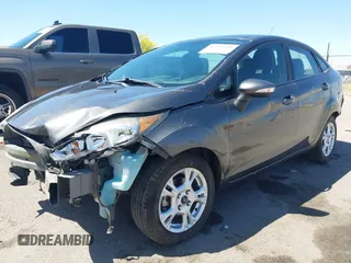2015 Ford Fiesta SE with VIN 3FADP4BJ1FM217045, listed as a IAAI auction lot 42120444 with 119,207 mi miles and . Bid and sale history available at DreamBid. Image 18.