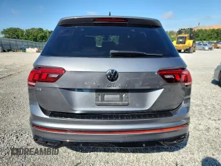2023 Volkswagen Tiguan SE R-Line Black with VIN 3VVCB7AX3PM056471, listed as a Copart auction lot 60679225 with 94,752 mi miles and Clean title. Bid and sale history available at DreamBid. Image 6.