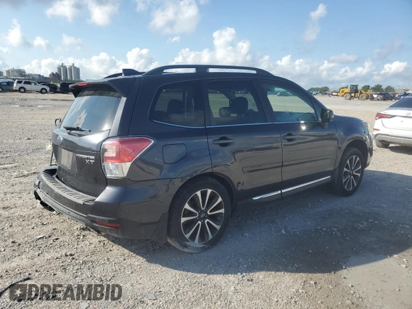 2017 Subaru Forester Touring with VIN JF2SJGWC5HH482107, listed as a Copart auction lot 60975725 with 71,889 mi miles and Salvage title. Bid and sale history available at DreamBid. Image 3.