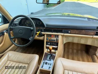 1986 Mercedes-Benz 560 with VIN WDBCA39D0GA203068, listed as a Copart auction lot 56704555 with 107,817 mi miles and Clean Title. Bid and sale history available at DreamBid. Image 9.