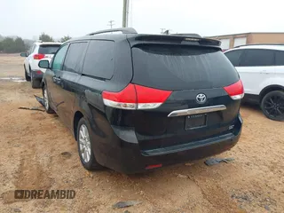 2012 Toyota Sienna XLE with VIN 5TDDK3DC3CS030466, listed as a IAAI auction lot 41914368 with 174,512 mi miles. Bid and sale history available at carsss.com. Image 3.