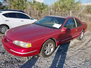 1997 Ford Thunderbird LX with VIN 1FALP62W8VH150725, listed as a IAAI auction lot 41549743 with 106,211 mi miles and . Bid and sale history available at DreamBid. Image 2.