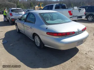 1999 Mercury Sable GS with VIN 1MEFM50U0XG609913, listed as a IAAI auction lot 41783308 with 80,022 mi miles. Bid and sale history available at carsss.com. Image 3.