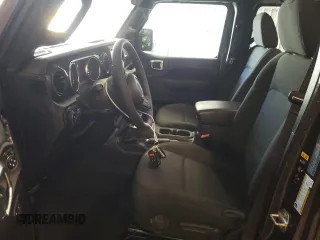 2023 Jeep Wrangler Sport Altitude with VIN 1C4HJXDG0PW679789, listed as a Copart auction lot 65991094 with 13,503 mi miles and Salvage Title. Bid and sale history available at DreamBid. Image 7.
