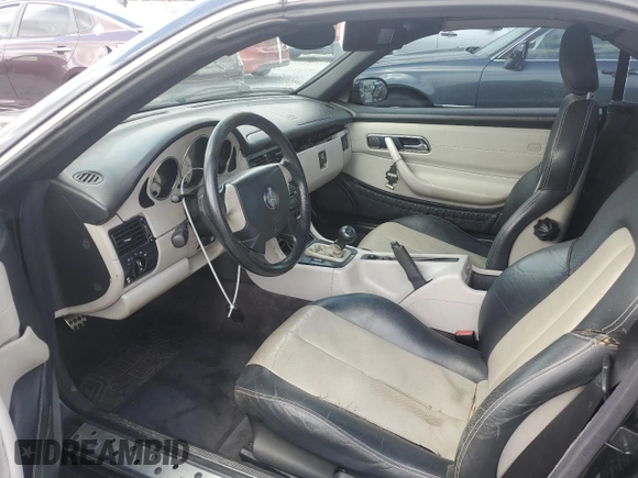 1999 Mercedes-Benz SLK-Class with VIN WDBKK47F2XF102927, listed as a Copart auction lot 50265585 with 184,918 mi miles and Salvage Title. Bid and sale history available at carsss.com. Image 7.