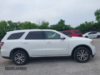 2016 Dodge Durango Limited with VIN 1C4RDJDGXGC387223, listed as a IAAI auction lot 42046793 with 156,032 mi miles and . Bid and sale history available at DreamBid. Image 13.