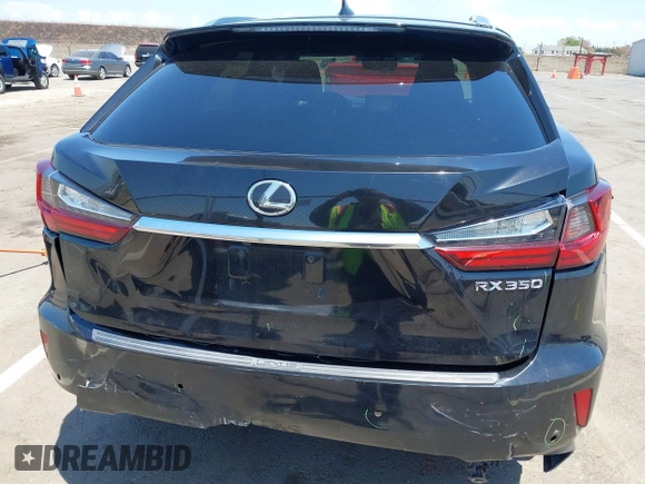 2016 Lexus RX 350 z VIN 2T2ZZMCA2GC031660, wystawiony jako IAAI lot #42460584 z przebiegiem 90 978 mil mil oraz . Historia ofert i sprzedaży dostępna na DreamBid. Obrazek 6.
