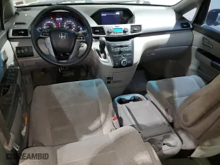 2012 Honda Odyssey EX with VIN 5FNRL5H44CB072084, listed as a Copart auction lot 50025805 with 164,907 mi miles and Salvage Title. Bid and sale history available at carsss.com. Image 8.