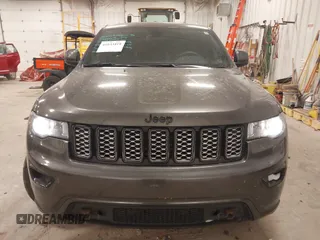 2018 Jeep Grand Cherokee Laredo E with VIN 1C4RJFAG6JC499261, listed as a IAAI auction lot 41033418 with 67,554 mi miles and . Bid and sale history available at DreamBid. Image 12.