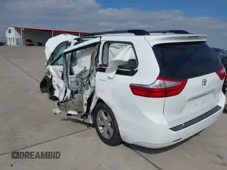 2016 Toyota Sienna LE AAS with VIN 5TDKK3DC2GS731724, listed as a IAAI auction lot 41631571 with 88,900 mi miles. Bid and sale history available at carsss.com. Image 6.