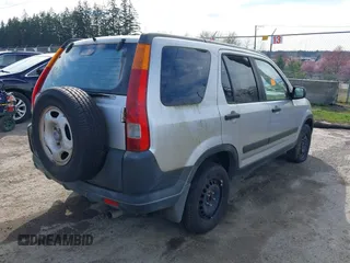 2002 Honda CR-V LX with VIN JHLRD68432C013805, listed as a IAAI auction lot 41890509 with 367,650 mi miles and . Bid and sale history available at carsss.com. Image 4.