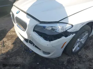 2012 BMW 5 Series 528i xDrive with VIN WBAXH5C57CDW06059, listed as a IAAI auction lot 41402225 with 167,656 mi miles. Bid and sale history available at carsss.com. Image 6.