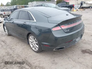 2015 Lincoln MKZ Hybrid with VIN 3LN6L2LU5FR600318, listed as a IAAI auction lot 41554230 with 179,935 mi miles. Bid and sale history available at carsss.com. Image 3.