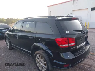2015 Dodge Journey SXT with VIN 3C4PDCBG7FT556929, listed as a IAAI auction lot 42664149 with 191,980 mi miles and . Bid and sale history available at DreamBid. Image 3.