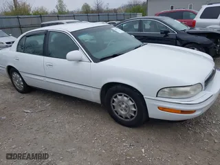 1999 Buick Park Avenue Ultra with VIN 1G4CU5217X4658627, listed as a IAAI auction lot 42013174 with 148,856 mi miles. Bid and sale history available at carsss.com. Image 1.
