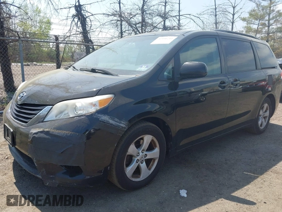 2011 Toyota Sienna LE AAS with VIN 5TDKK3DC4BS173688, listed as a IAAI auction lot 42106211 with 282,301 mi miles. Bid and sale history available at carsss.com. Image 17.