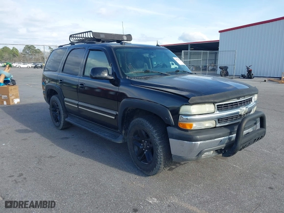 2004 Chevrolet Tahoe LT with VIN 1GNEC13ZX4J106072, listed as a IAAI auction lot 41703828 with 275,081 mi miles. Bid and sale history available at carsss.com. Image 1.