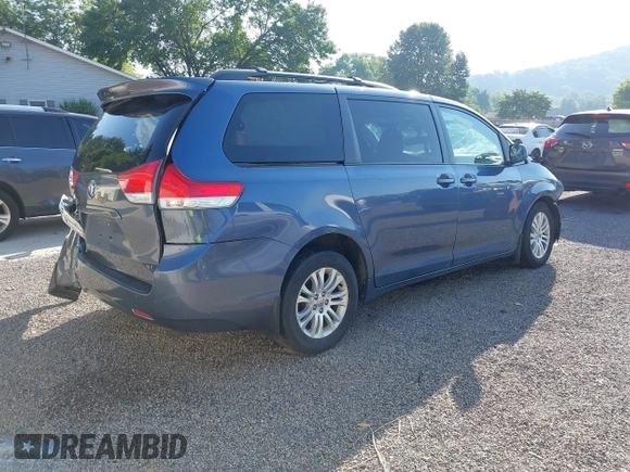 2014 Toyota Sienna XLE with VIN 5TDYK3DCXES524294, listed as a IAAI auction lot 42546467 with 122,257 mi miles and . Bid and sale history available at DreamBid. Image 4.